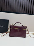 Chanel Lizard-Embossed Vanity Top Handle Bag in Bordeaux